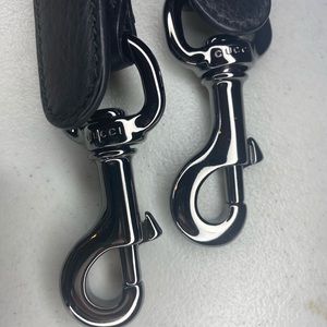 Gucci black leather strap with gunmetal hardware